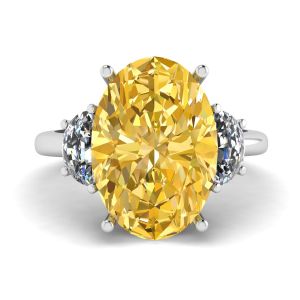 Diamante amarelo oval com anel de diamantes brancos meia-lua lateral ouro branco